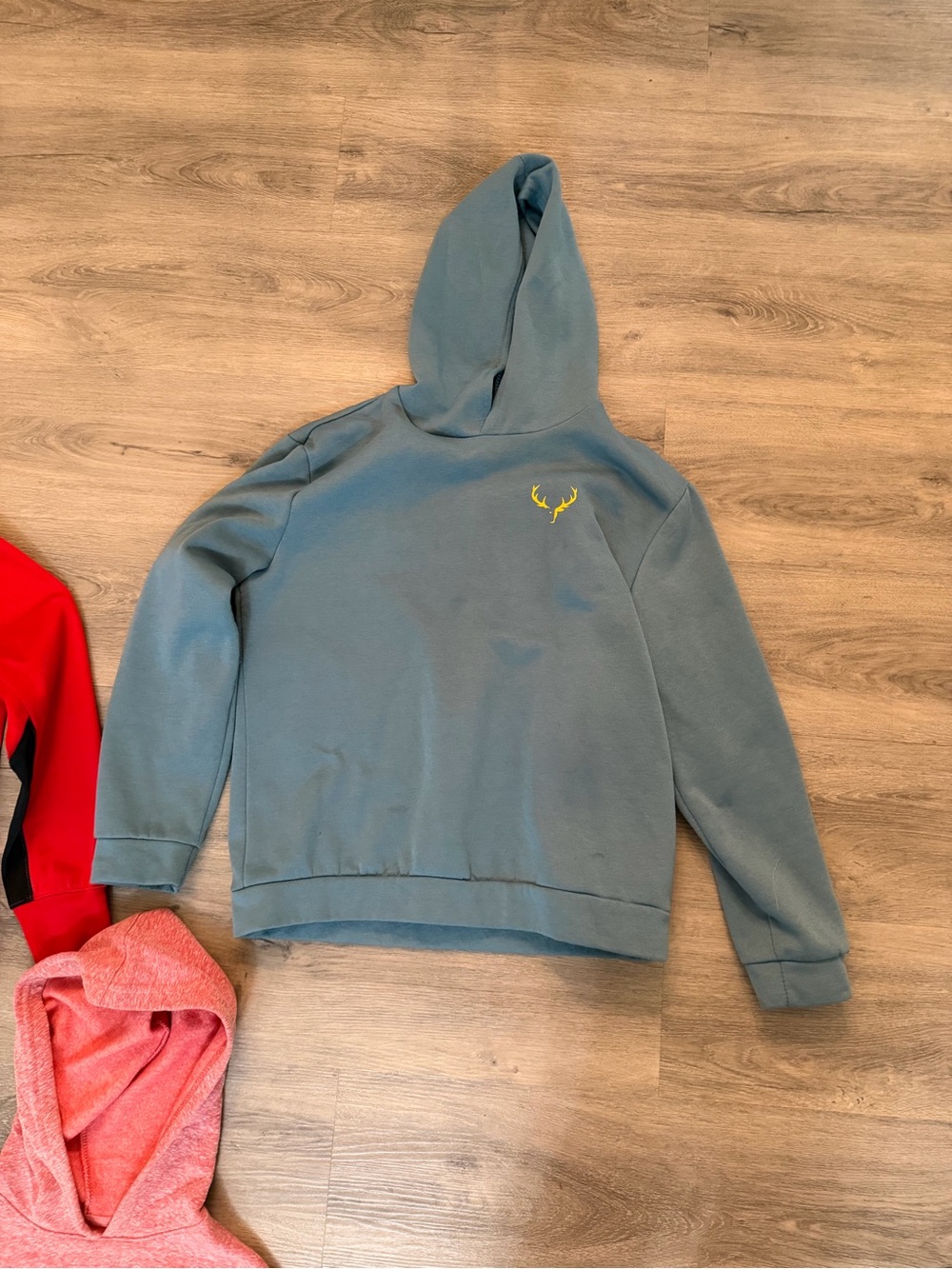 Slate Blue Hooded Sweatshirt with Yellow Antler Accent